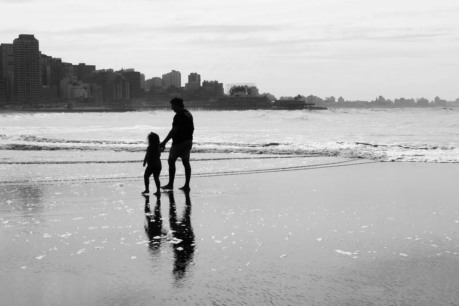 Family walking on a beach